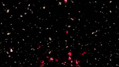 Konfetilerin düşüşünün animasyonu ve siyah arka planda kırmızı kalpler. Sevgililer Günü, aşk ve romantizm konsepti dijital olarak oluşturulmuş video.