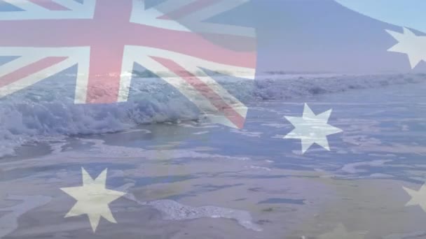 日当たりの良いビーチや海に手を振ってオーストラリアの旗のアニメーション 愛国心や休日やお祝いの概念デジタルで生成されたビデオ — ストック動画