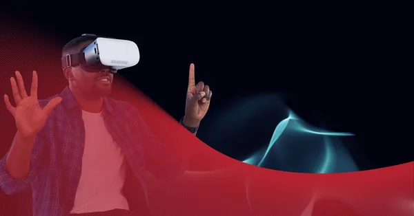 Zusammensetzung Der Blauen Lichtwellen Und Mann Trägt Headset Berührt Virtuellen — Stockfoto