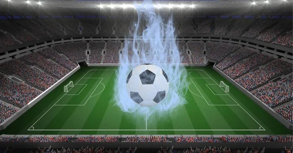 Composition of football in flames at empty football stadium with lights. sport and competition concept digitally generated image.