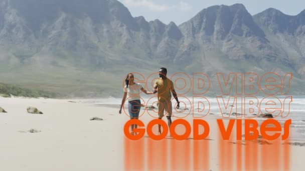 Animation Der Worte Good Vibes Orange Geschrieben Über Ein Paar — Stockvideo