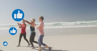 Kumsalda koşan kadınlar için, semboller gibi baş parmak hareketlerinin canlandırılması. Sosyal medya, olumlu duygular, refah ve iletişim ağı konsepti, dijital olarak üretilmiş vi