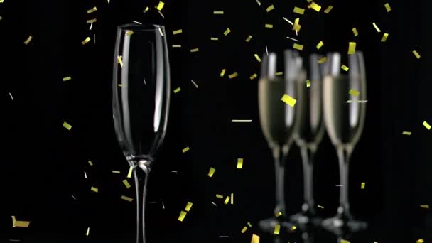 Animering Guld Konfetti Faller Över Glas Champagne Svart Bakgrund Fest — Stockvideo