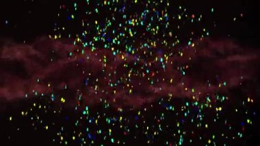 Siyah arka planda hareket eden kırmızı bulutun üzerine düşen renkli konfeti animasyonu. doğa, kutlama, parti, enerji ve olay kavramı dijital olarak oluşturulmuş video.