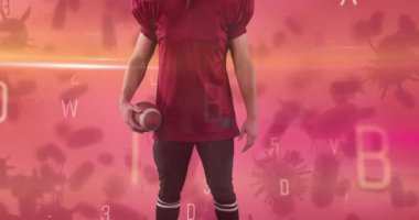 Harflerin değişiminin animasyonu ve Amerikan futbolcusu üzerinde covid 19 hücre. Dijital olarak üretilen covid 19 pandemik konsept sırasında spor ve rekabet.