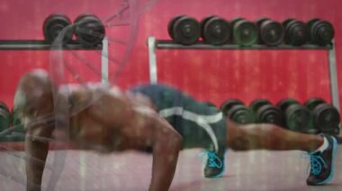 Sporcu üzerinde dönen DNA ipliği ve veri işleme ile dijital arayüzün animasyonu. Tıbbi araştırma teknolojisi ve spor konsepti dijital olarak üretilen animasyon.