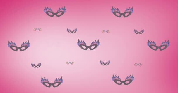 ピンクの背景にカーニバルマスクのアニメーションが繰り返されます ファッションやアクセサリーの背景パターンコンセプトデジタルアニメーション — ストック動画