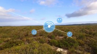 Manzara üzerindeki simgelerle bağlantılı ağların animasyonu. küresel bağlantılar, iş dünyası, dijital arayüz, teknoloji ve ağ konsepti dijital olarak oluşturulmuş video.