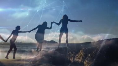 Mutlu arkadaş grubunun kumsal boyunca yürümesi ve eğlenmesi üzerine bağlantı ağlarının animasyonu. Genel bağlantı, konsept olarak dijital olarak oluşturulmuş video.