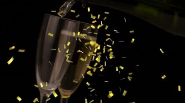 Siyah arka planda şampanya bardaklarının üzerine düşen konfeti animasyonu. parti ve kutlama konsepti dijital olarak oluşturulmuş video.