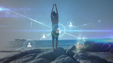 Yoga yapan bir kadının üzerine dünyanın animasyonu. Genel bağlantı, konsept olarak dijital olarak oluşturulmuş video.