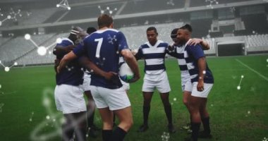 Stadyumdaki erkek rugby oyuncuları üzerinde kimyasal yapıların animasyonu. spor ve yarışma konsepti dijital olarak oluşturulmuş video.