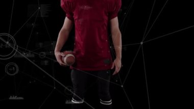 Siyah arka planda Amerikan futbolcusu üzerinden bağlantı ağının animasyonu. global spor, rekabet ve bağlantılar dijital olarak oluşturulmuş video konsepti.