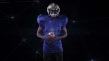 Siyah arka planda Amerikan futbolcusu üzerinden bağlantı ağının animasyonu. global spor, rekabet ve bağlantılar dijital olarak oluşturulmuş video konsepti.