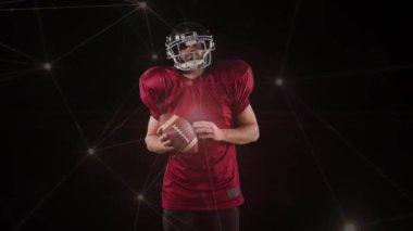 Siyah arka planda Amerikan futbolcusu üzerinden bağlantı ağının animasyonu. global spor, rekabet ve bağlantılar dijital olarak oluşturulmuş video konsepti.