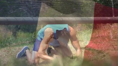 Bayrak animasyonu, güçlü kaslı adamın pisti aşması üzerine Fransa 'ya gider. global spor, fitness ve egzersiz konsepti dijital olarak oluşturulmuş video.