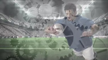Spor stadyumunda rugby maçı sırasında ragbi oyuncusunu deviren çarkların animasyonu. küresel spor, rekabet ve veri işleme kavramı dijital olarak oluşturulmuş video.
