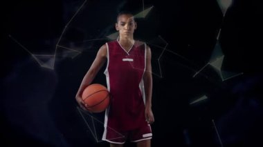 Siyah arka planda basketbol oyuncusu üzerinden bağlantı ağı olan dünyanın animasyonu. global spor, rekabet ve bağlantılar dijital olarak oluşturulmuş video konsepti.