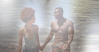 Denizin ötesindeki kumsalda mutlu bir Afrikalı Amerikalı çiftin animasyonu. Birlikte boş zaman geçirmek, mutlu tatiller ve boş zaman, dijital olarak oluşturulmuş video.