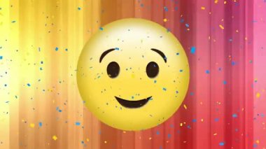 Gülümseyen emoji ikonunun üzerine düşen konfeti animasyonu. Pembe arka planda parlayan sarı üzerine. küresel sosyal medya ve iletişim konsepti dijital olarak oluşturulmuş video.