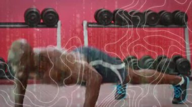 Veri işleme animasyonu ve şınav çeken adamın üzerindeki beyaz çizgiler. spor, fitness ve aktif yaşam tarzı konsepti dijital olarak oluşturulmuş video.