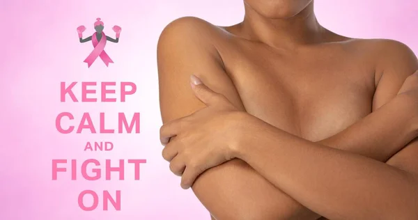 Composition of pink ribbon logo and breast cancer text, with woman covering bust with hands. breast cancer positive awareness campaign concept digitally generated image.