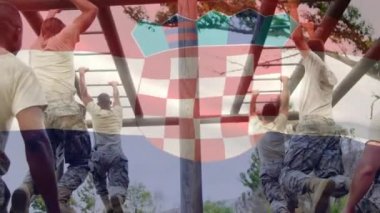 Maymun parmaklıklarında egzersiz yapan askerlerin üzerinde sallanan Hırvat bayrağının animasyonu. Vatanseverlik ve silahlı kuvvetler kavramı dijital olarak oluşturulmuş video.