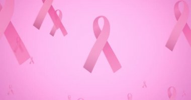 Pembe arka planda uçan pembe kurdele logosu animasyonu. Göğüs kanseri pozitif farkındalık kampanyası konsepti dijital olarak üretildi.