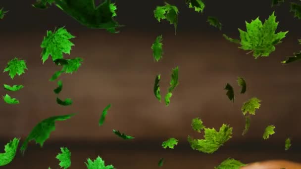 Animación Múltiples Hojas Verdes Cayendo Sobre Fondo Marrón Naturaleza Otoño — Vídeo de stock