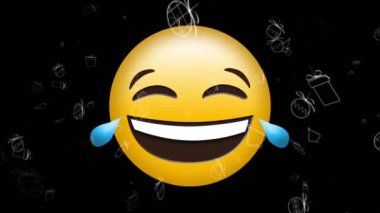 Siyah arka planda düşen Noel simgeleri üzerine mutlu emoji simgesinin animasyonu. küresel sosyal medya ve iletişim konsepti dijital olarak oluşturulmuş video.