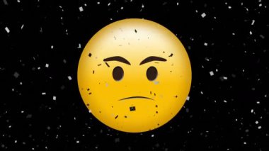 Digital animation of confetti falling over angry face emoji against black background. expression and communication concept