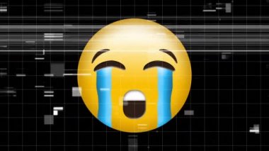 Digital animation of tv static effect over crying face emoji against black background. expression and communication concept