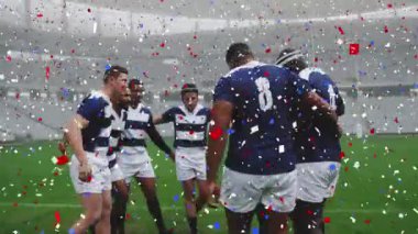 Stadyumdaki maçta erkek rugby oyuncuları üzerinde konfeti animasyonu. spor ve yarışma konsepti dijital olarak oluşturulmuş video.