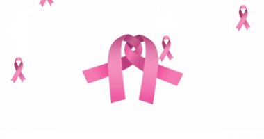 Beyaz arka planda pembe kurdelelerin üzerine düşen çoklu pembe kurdele logosu animasyonu. Göğüs kanseri pozitif farkındalık kampanyası konsepti dijital olarak üretildi.