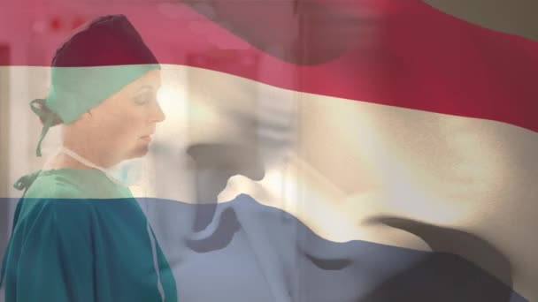 Digitale Samenstelling Van Vlag Van Nederland Zwaaiend Met Gestresste Blanke — Stockvideo