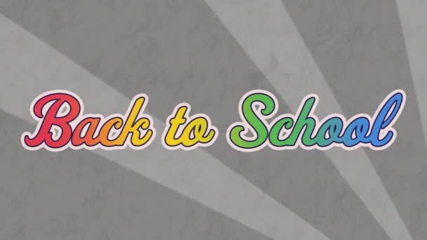 虹効果のデジタルアニメーションは 灰色の放射状背景に対する学校のテキストに戻ります 学校や教育の概念に戻り — ストック動画