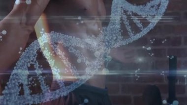 Spor salonunda kaslarını esneten beyaz formda bir adama karşı DNA yapısı ve moleküler yapılar. Spor ve spor teknolojisi kavramı