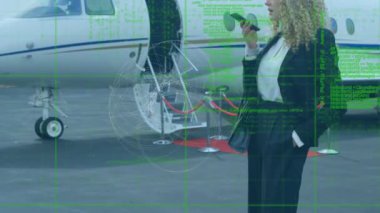 Abstract shape and data processing over businesswoman talking on smartphone at airport runway. business travel and technology concept