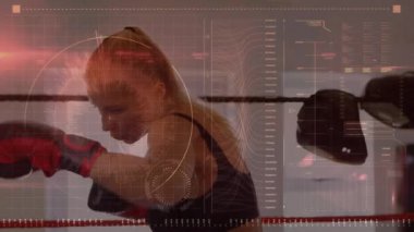 Kafkas kadın boksörlere karşı veri işleme. Boks ringinde yumruk pratiği yapıyor. Spor, spor ve teknoloji konsepti