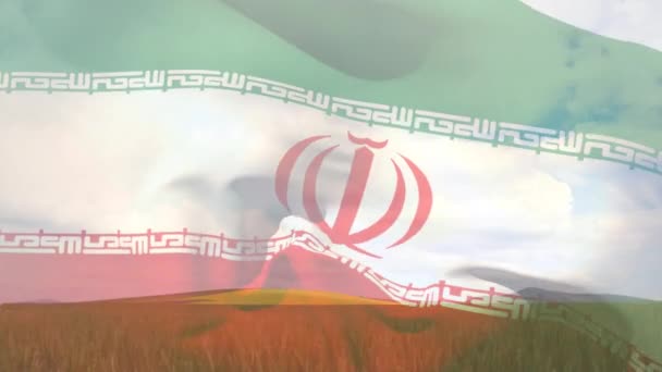 Komposisi Digital Melambaikan Bendera Iran Terhadap Pandangan Lanskap Ladang Pertanian — Stok Video