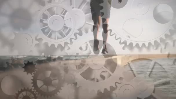フィット感のある男が走る上で回転するコグのアニメーション スポーツ フィットネス データ処理の概念をデジタルで生成したビデオ — ストック動画