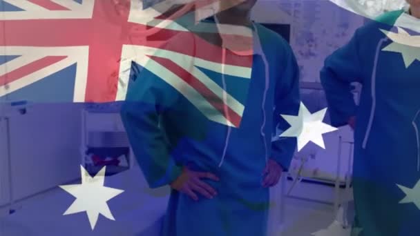 Composición Digital Bandera Australia Ondeando Contra Diversos Cirujanos Masculinos Que — Vídeo de stock