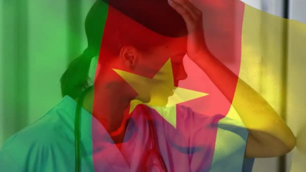 Cameroon Flag Waving Stressed African American Female Health Worker Hospital — Stock Video