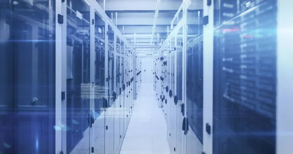 Image of data processing and digital information flowing through network of computer servers in a server room with glowing lights. Global network of internet service provider or data processing centre concept.