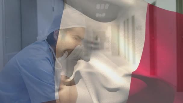 Digital Composition France Flag Waving Stressed Caucasian Male Surgeon Hospital — Stock Video