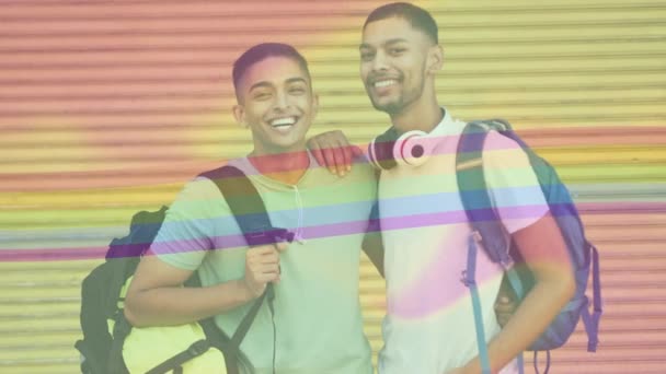 用彩虹和花朵在快乐的男同性恋夫妇身上勾勒出花朵的力量 人权与平等概念数码视频 — 图库视频影像