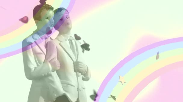 新しい2つのゲイの新郎の人形の上に虹と花とフラワーパワーテキストのアニメーション 人権と平等の概念をデジタルで生成し — ストック動画