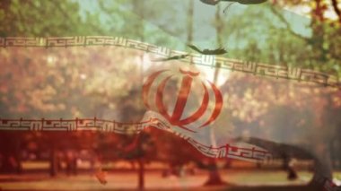 Birçok sonbahar yapraklarının üzerine düşen İran bayrağının dijital bileşimi. Sonbahar mevsimi konsepti