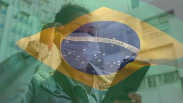 Brazilië Zwaait Vlag Tegen Aziatische Vrouw Dragen Gezichtsmasker Met Behulp — Stockvideo