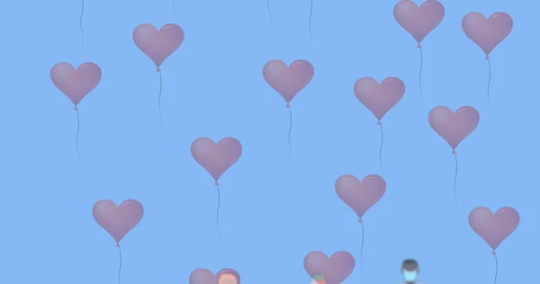 Afbeelding Van Meerdere Hartvormige Ballonnen Tegen Silhouetten Van Gezondheidswerkers Met — Stockfoto